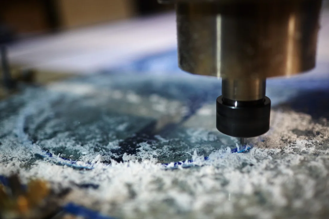 cnc machine cutting a plastic material